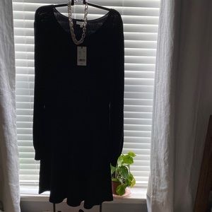 a loves a Black A-Line Dress with Stretch Ribbed Top 80% Rayon 20% Nylon
USA XL